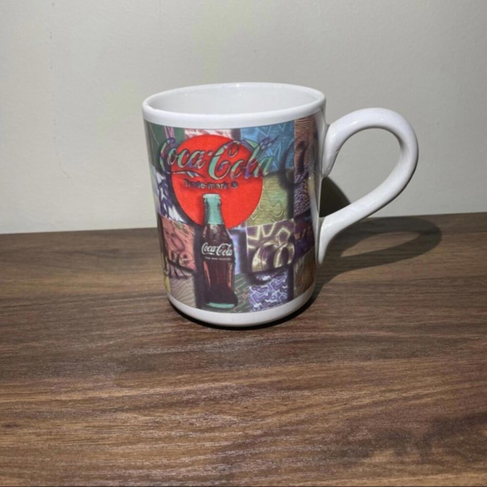 1997 Coca-Cola mug multi colored